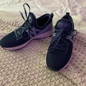 Women’s UA tennis shoes